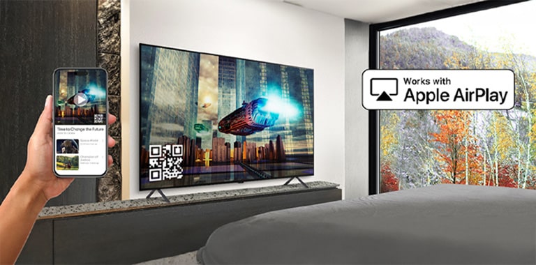 A hotel guest is pairing their iPhone with the in-room TV through AirPlay.