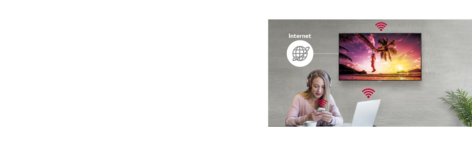 The UM3DG-H series is on the wall and a woman using a personal PC and mobile phone. And this image shows that the signage can be connected wirelessly to the PC and mobile phone she is holding.