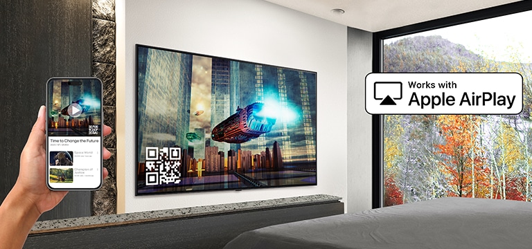 A hotel guest is pairing their iPhone with the in-room TV through AirPlay.