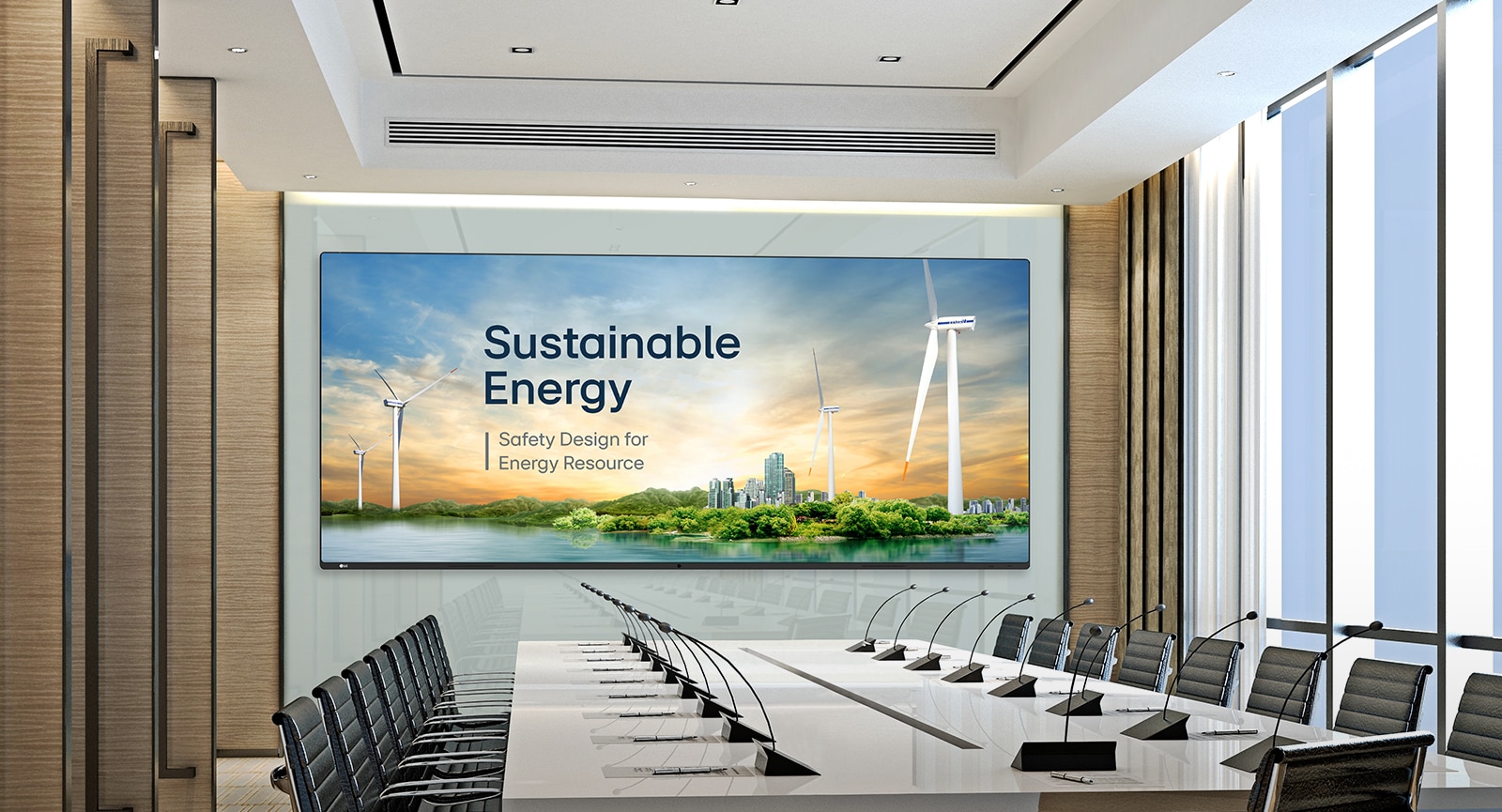 A wide display is installed on the wall of the spacious conference hall, and presentation is prominently and clearly displayed on the large screen.