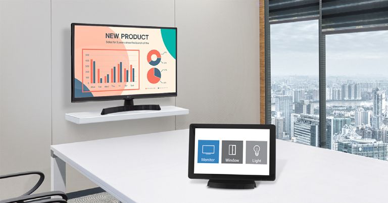 The LG TV Signage, windows, and lights are all connected to the controller placed on the desk.