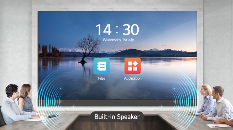 People have a meeting while watching the display and listening to sound from the built-in speakers of the LABB installed in the meeting room.