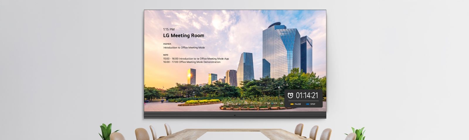 The LABB is installed on the meeting room wall and displays details such as the room number, meeting agenda, and timer through its Office Meeting Mode.
