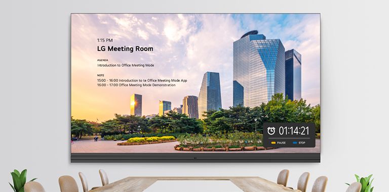 The LABB is installed on the meeting room wall and displays details such as the room number, meeting agenda, and timer through its Office Meeting Mode.