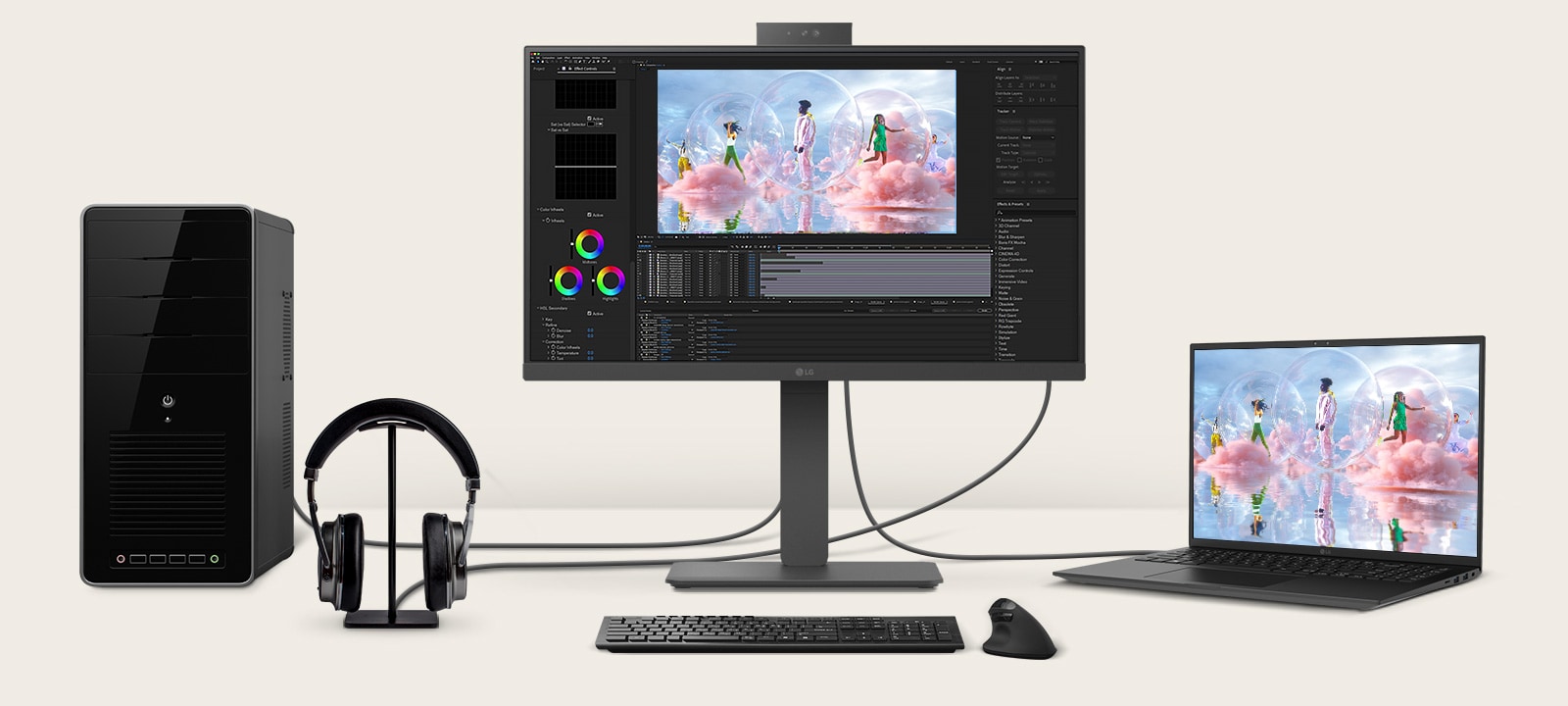 Front view showing a workstation with multiple devices connected to monitors. 