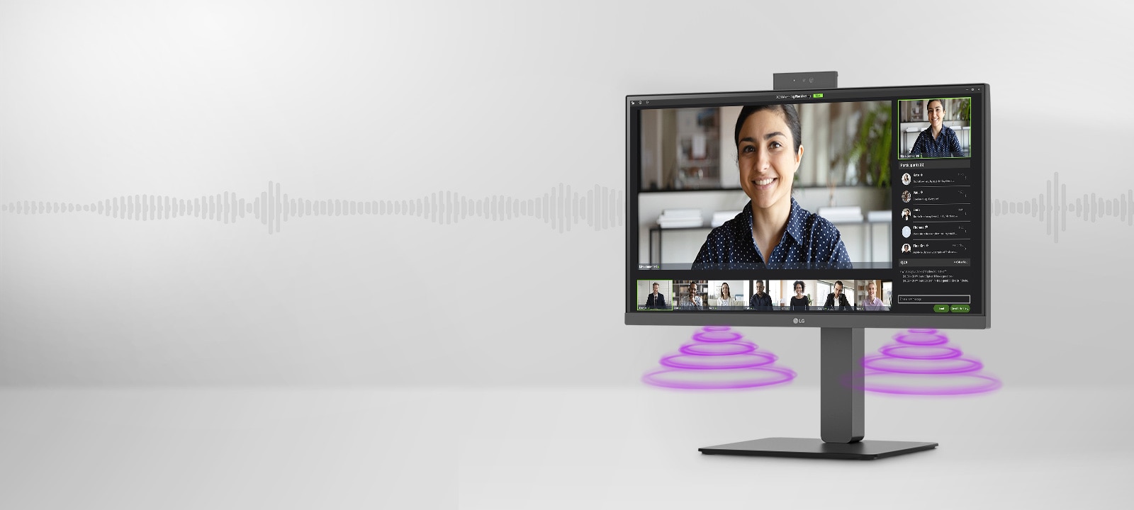 Side view showing video conference scene on the monitor.	