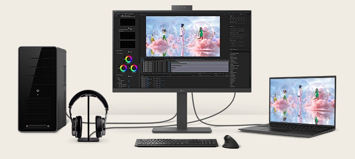 Front view showing a workstation with multiple devices connected to monitors.	
