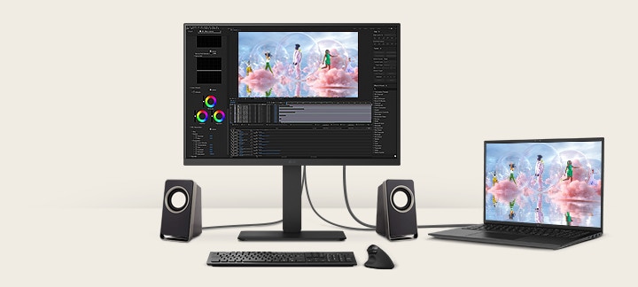 Front view showing a workstation with multiple devices connected to monitors.	