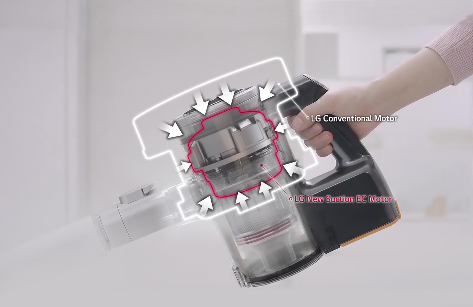 Person holding a hand stick vacuum cleaner,which is partially transparent so that the motor can be seen