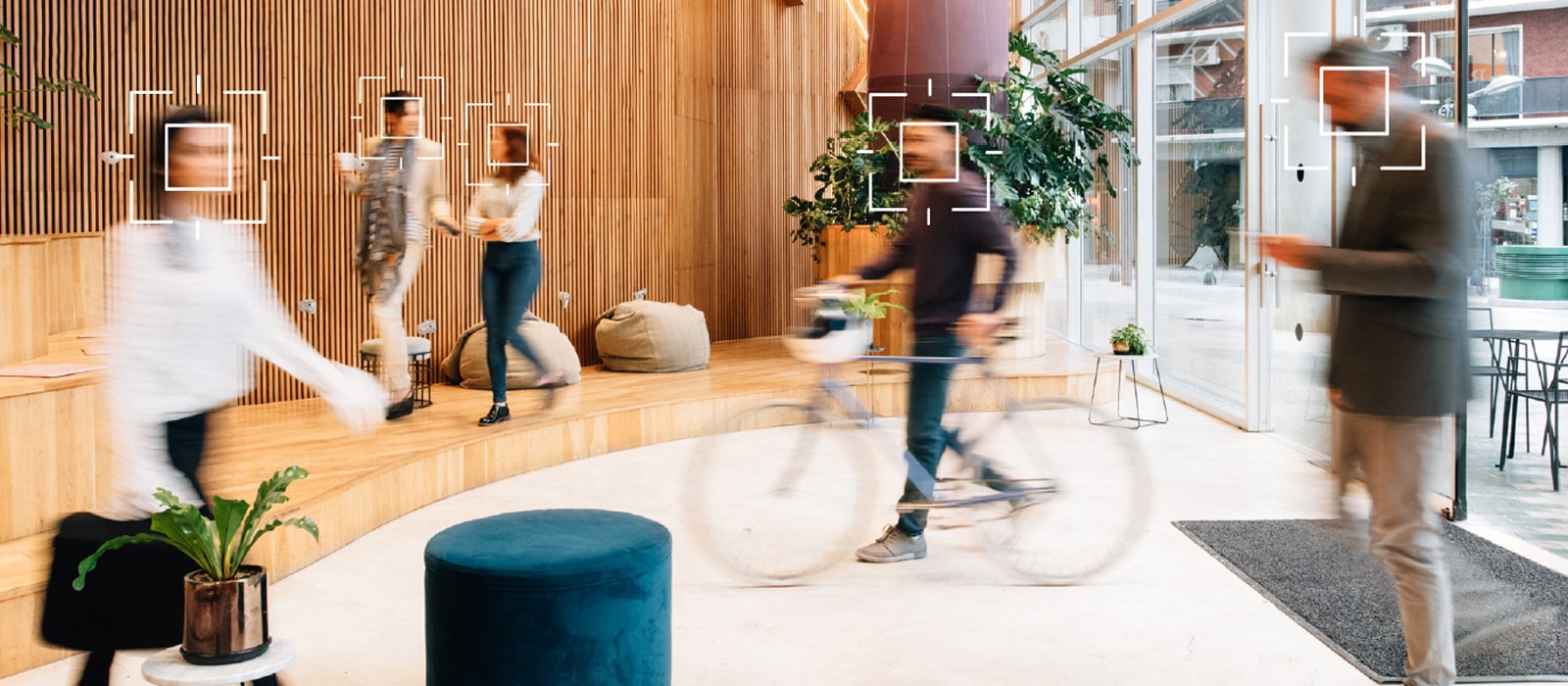 This image shows the view from the digital signage itself, demonstrating how it analyzes foot traffic data of people nearby.