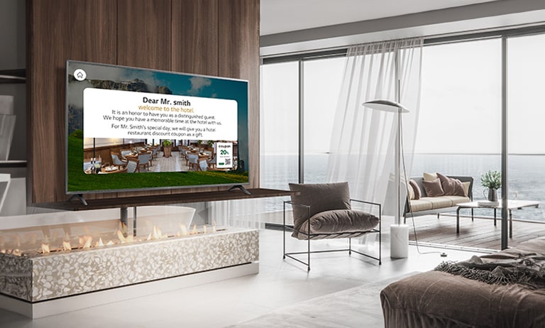 An LG commercial TV is installed in a resort room.