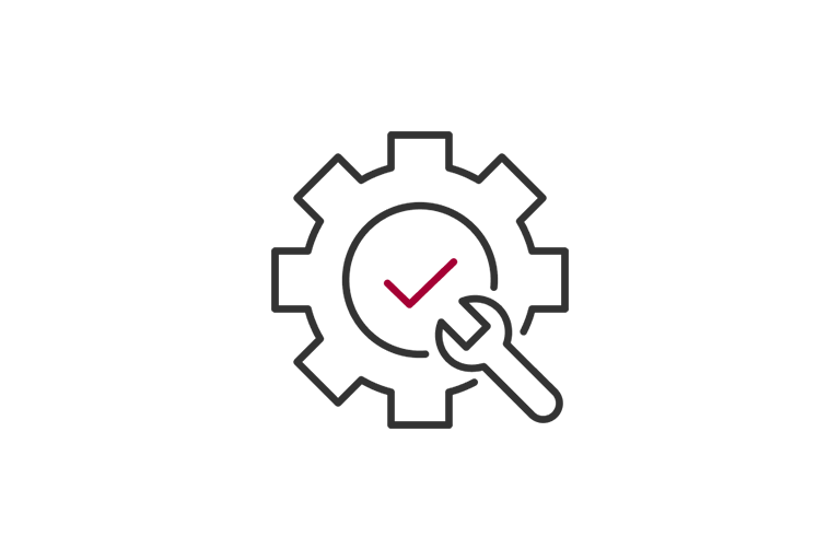 Gear with a wrench and checkmark, symbolizing successful maintenance or repair.