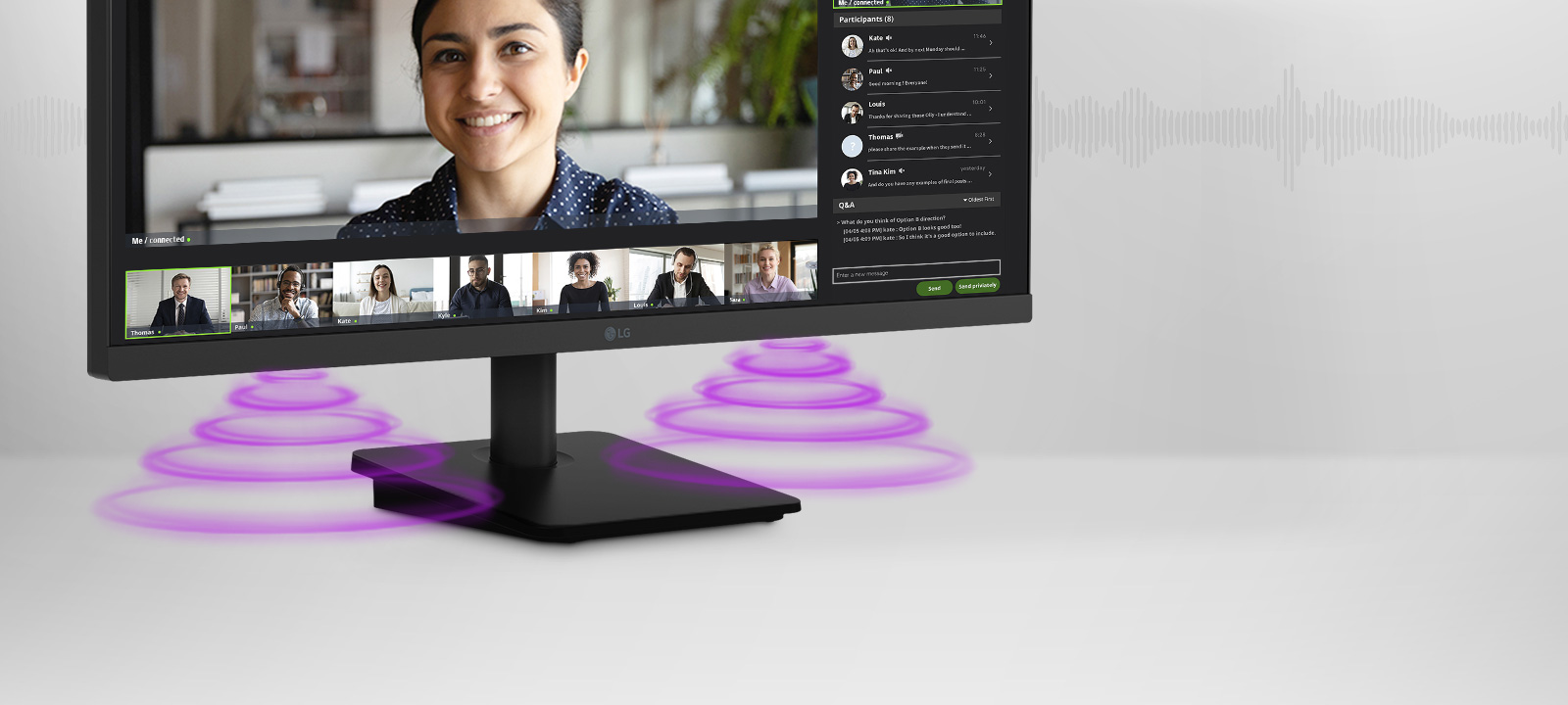 The monitor screen shows a video conference, while sound is coming from the speakers at the bottom of the monitor.	