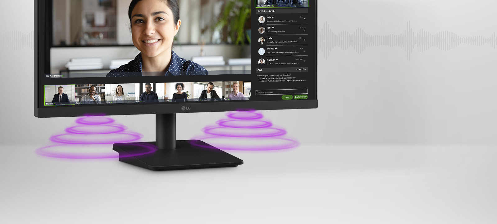 The monitor screen shows a video conference, while sound is coming from the speakers at the bottom of the monitor.	