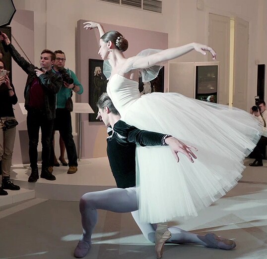 two ballerinas are performing on the stage at the lg signature artweek 2018 in russia