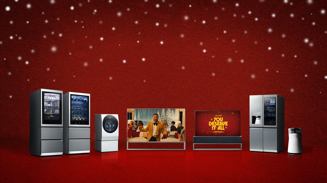 Various LG SIGNATURE products arranged in a red space.