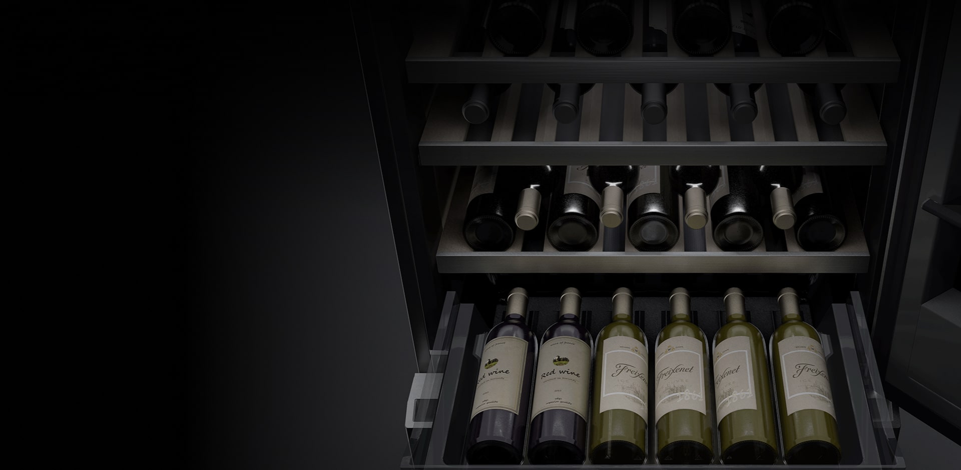 A close-up image of the inside of the wine cellar. Several bottles of wine are stored on the shelves, and the bottom shelf has been pulled out so that the wines can be easily viewed and accessed.