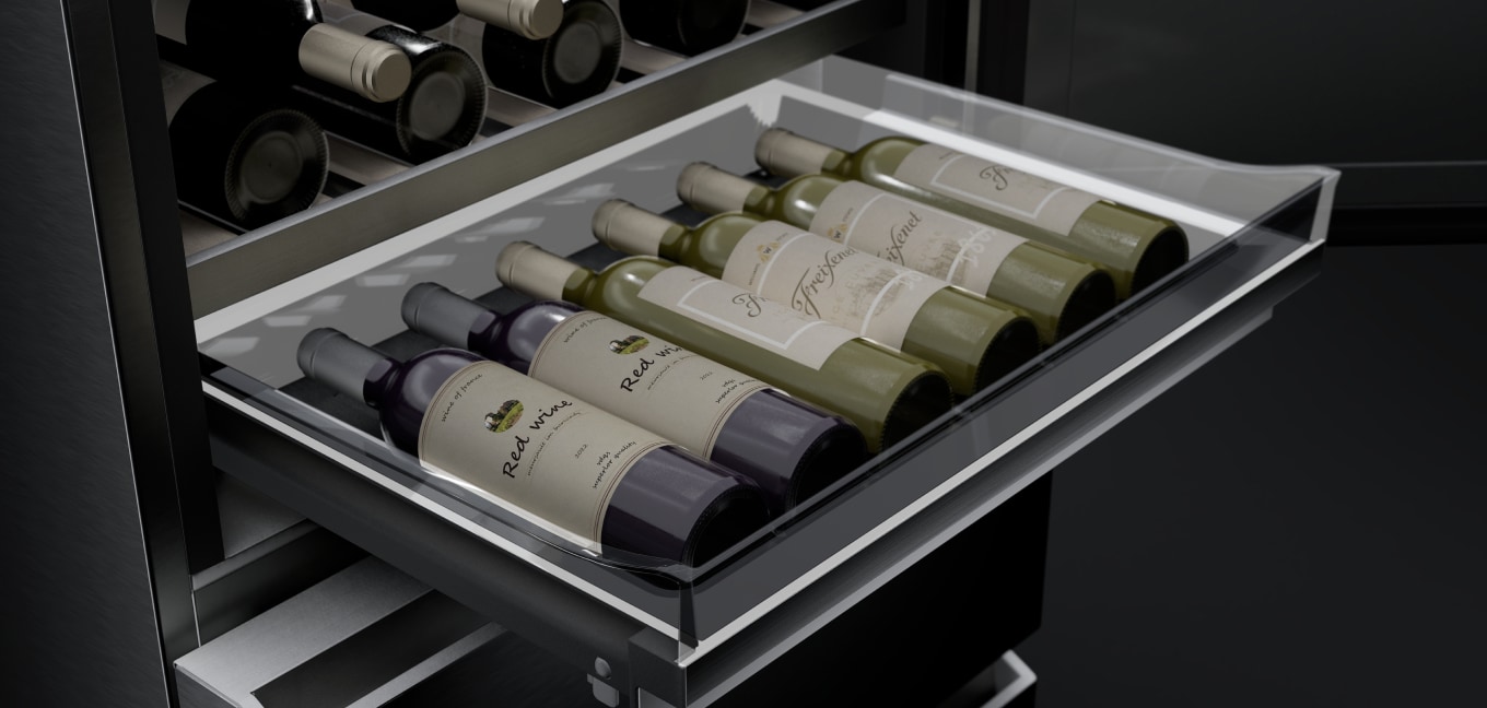 Close-up image of the convertible pantry drawer in an extended state, showing six bottles of wine neatly stored inside.