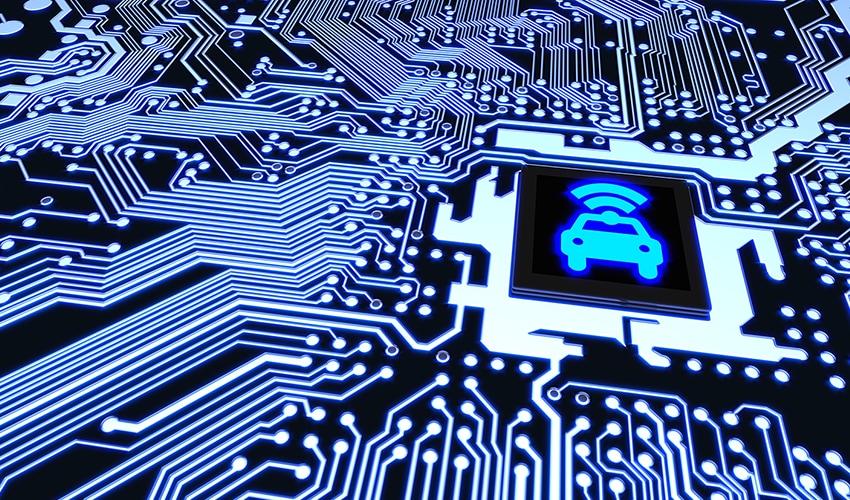 A blue image of a semiconductor chip with car icon