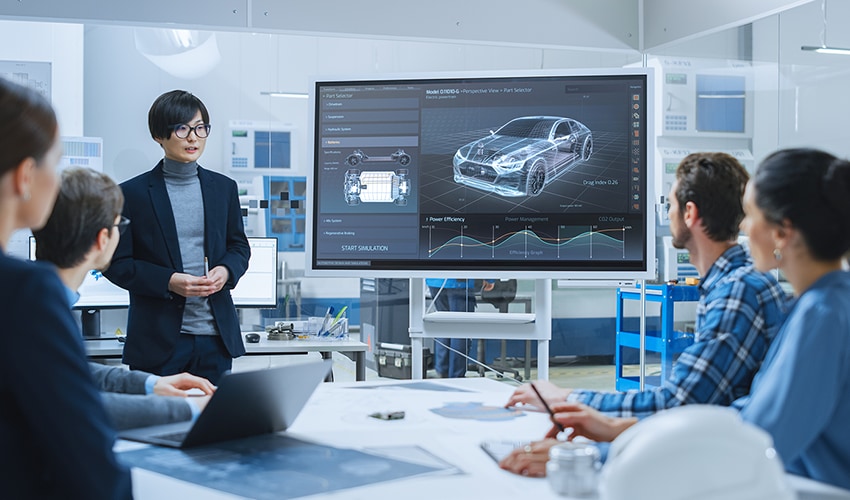 An image of a group of people having a meeting