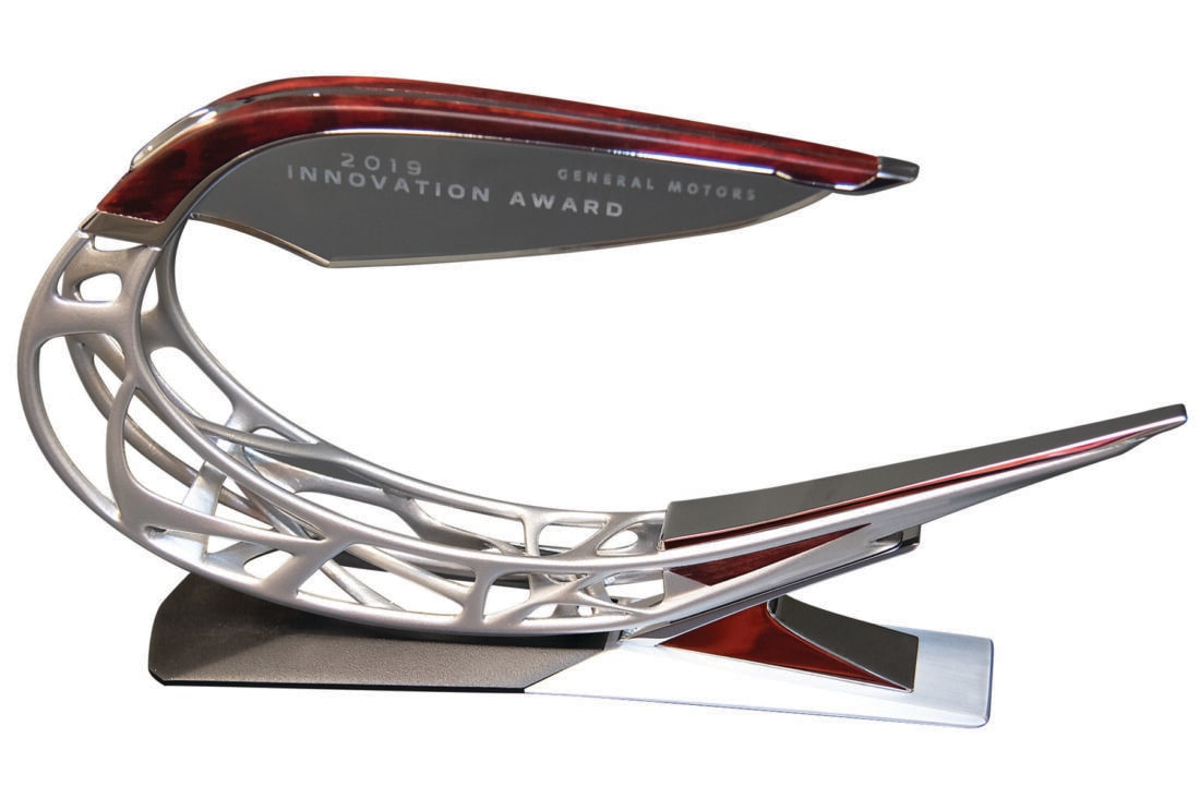 A close-up of the trophy, with the GM Innovation Award logo displayed