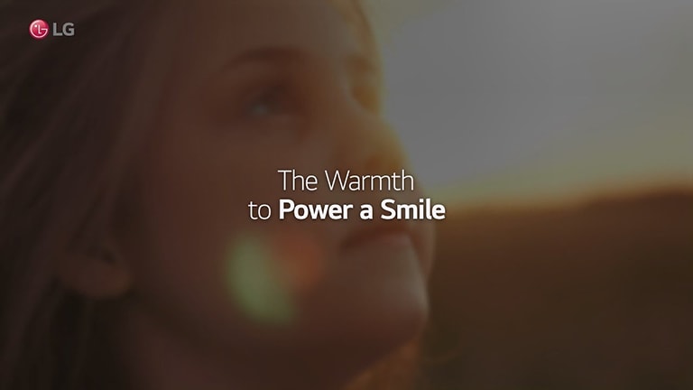 a blurred photo of a girl looking above, and the sentence 'The warmth to power a smile' is written above