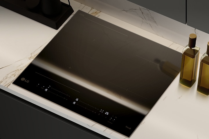 Αυτή η εικόνα δείχνει το γυαλιστερό μαύρο γυάλινο φινίρισμα των επαγωγικών εστιών.