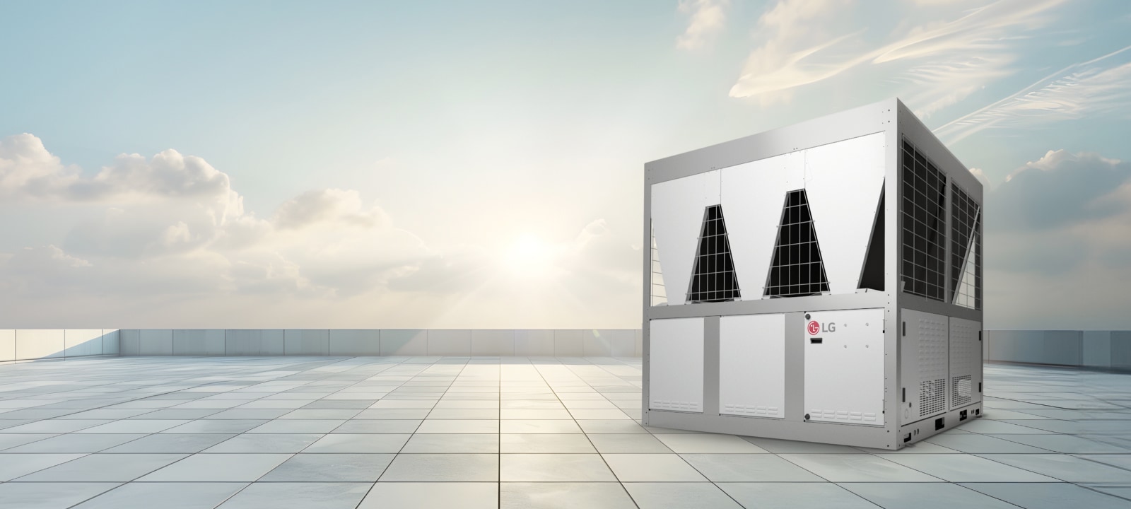 Ένα LG Inverter Scroll Chiller τοποθετείται σε μια ταράτσα με καθαρό ουρανό και απαλό φως του ήλιου στο φόντο.