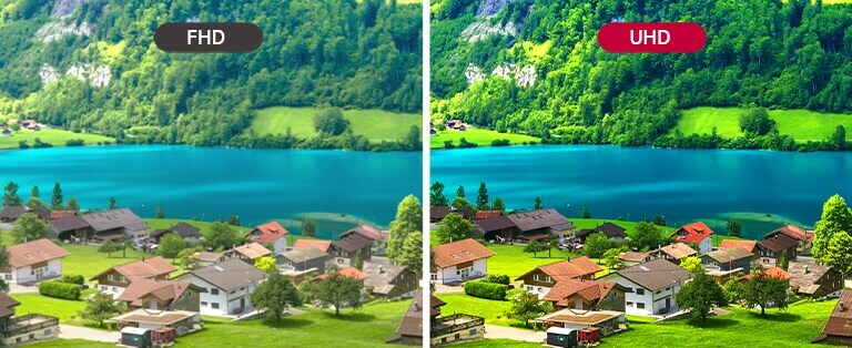 Μια μεγάλη οθόνη είναι εγκατεστημένη στον δρόμο και μια γυναίκα κοιτάζει μια διαφήμιση με ζωηρά χρώματα στην οθόνη.