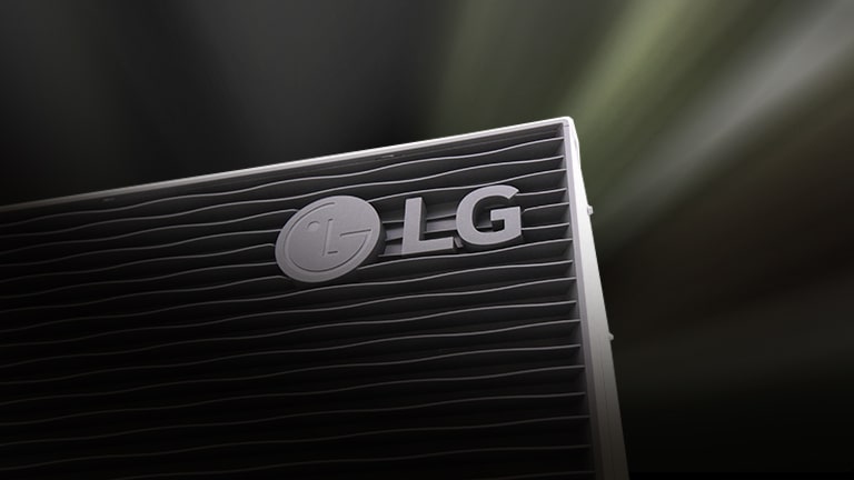 An image of the LG logo on a heat pump unit with a close-up view of the grille design.