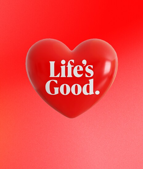 Το λογότυπο Life’s Good εμφανίζεται μέσα σε μια λαμπερή κόκκινη καρδιά.