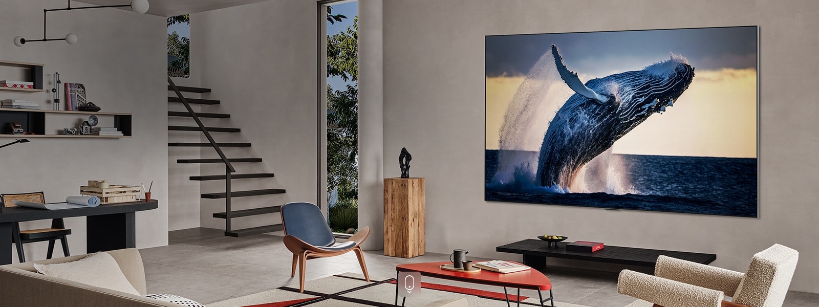 A TV in a stark room displays bright and vivid sunset on the screen.