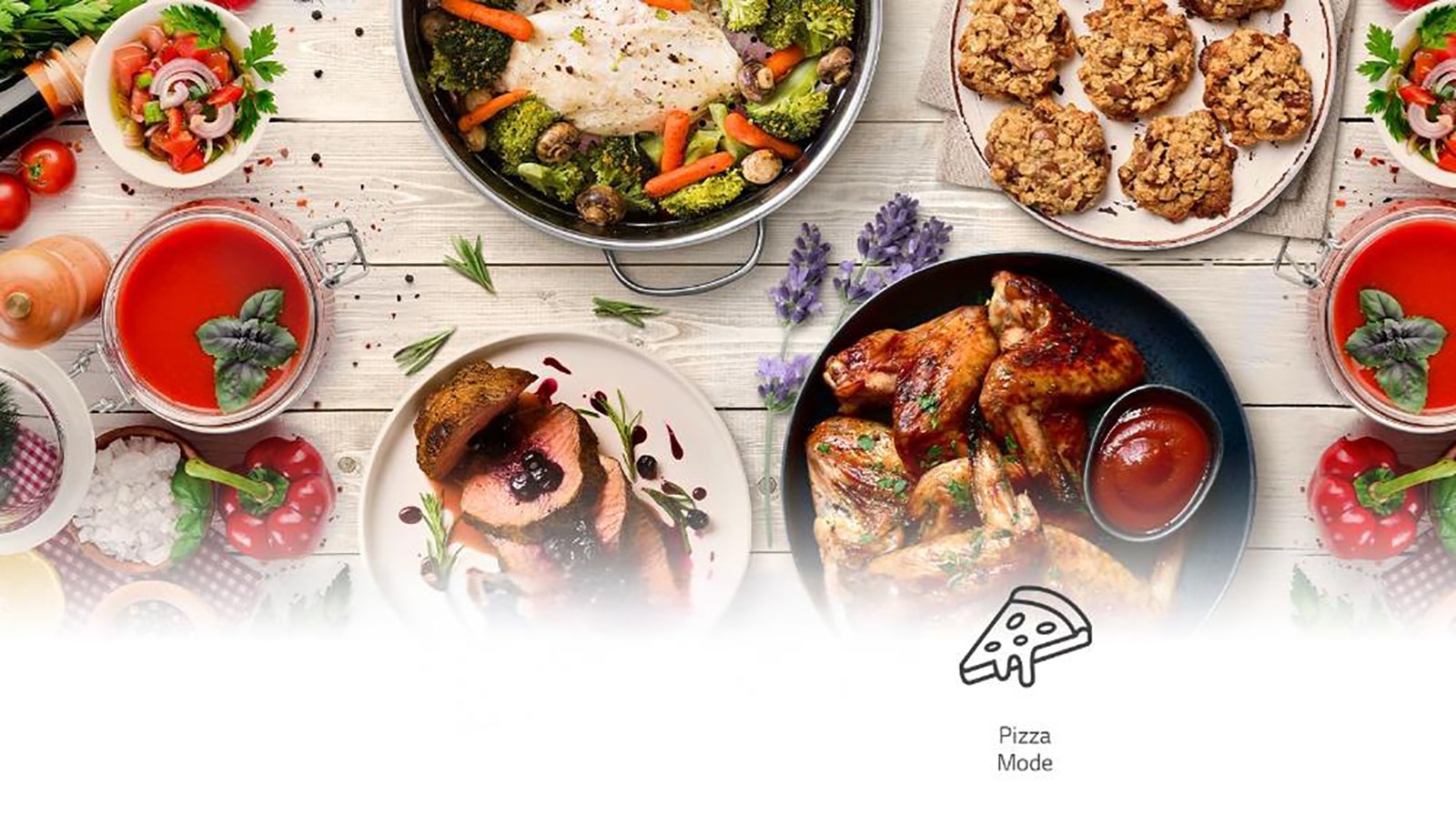 Αυτή είναι μια εικόνα με στήθη κοτόπουλου μαγειρεμένα στον ατμό, φτερούγες κοτόπουλου μαγειρεμένες σε φριτέζα αέρα, κουλουράκια και μια μπριζόλα μαγειρεμένη με air sous vide στο τραπέζι. Τα εικονίδια που αναπαριστάνουν τις λειτουργίες ProBake Convection, air sous vide, φριτέζα αέρος και ProBake Steam περιλαμβάνονται επίσης παρακάτω.