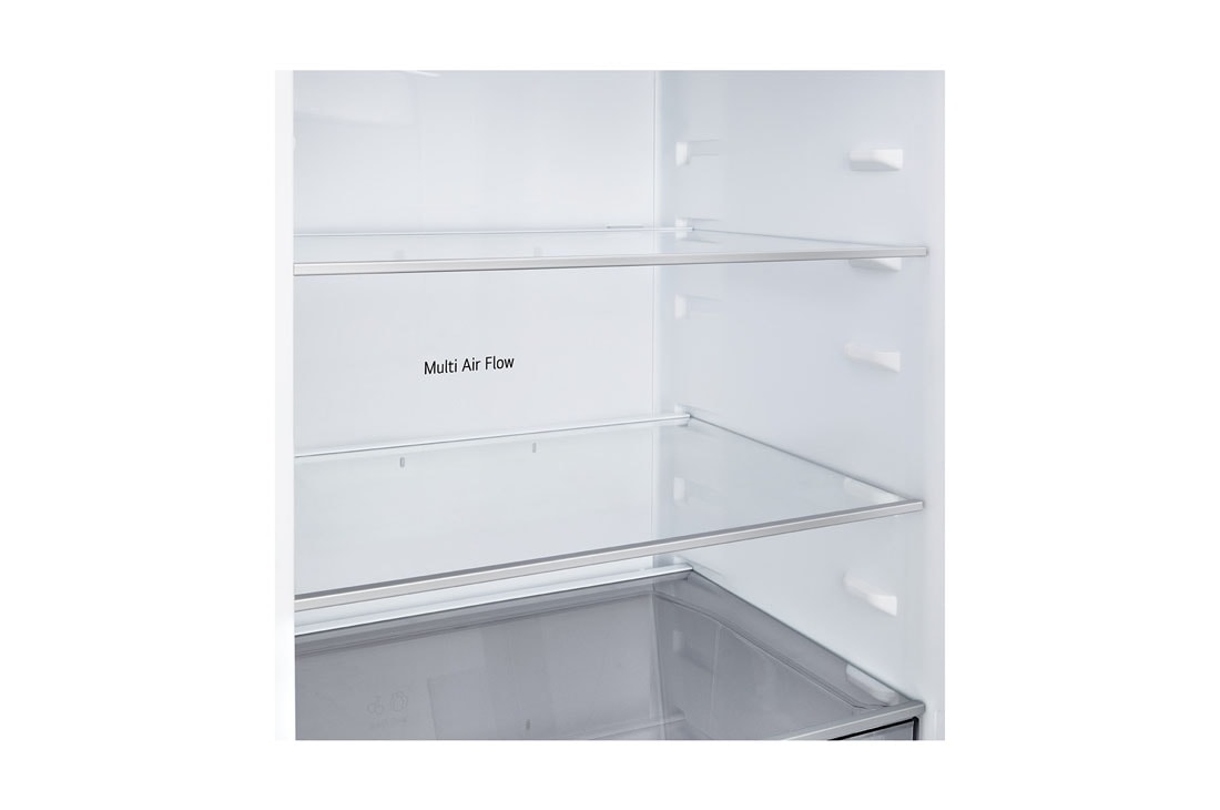 LG Ψυγειοκαταψύκτης Total No Frost 203 x 59,7 cm, LG ψυγειοκαταψύκτης εγκατεστημένος εντοιχισμένος σε ψηλό τοίχο σε ζεστή μπεζ απόχρωση με λευκά βέλη που δείχνουν την πάνω πλευρά και τις μπροστινές επιφάνειες, GBBSJ21DEP, thumbnail 6