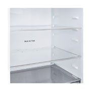 LG Ψυγειοκαταψύκτης Total No Frost 203 x 59,7 cm, LG ψυγειοκαταψύκτης εγκατεστημένος εντοιχισμένος σε ψηλό τοίχο σε ζεστή μπεζ απόχρωση με λευκά βέλη που δείχνουν την πάνω πλευρά και τις μπροστινές επιφάνειες, GBBSJ21DEP, thumbnail 6