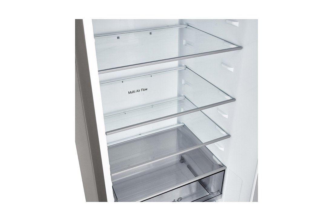 LG Ψυγειοκαταψύκτης Total No Frost με 203 x 59,5 cm, LG ψυγειοκαταψύκτης εγκατεστημένος εντοιχισμένος σε ψηλό τοίχο σε ζεστή μπεζ απόχρωση με λευκά βέλη που δείχνουν την πάνω πλευρά και τις μπροστινές επιφάνειες, GBBSJ21DPY, thumbnail 6