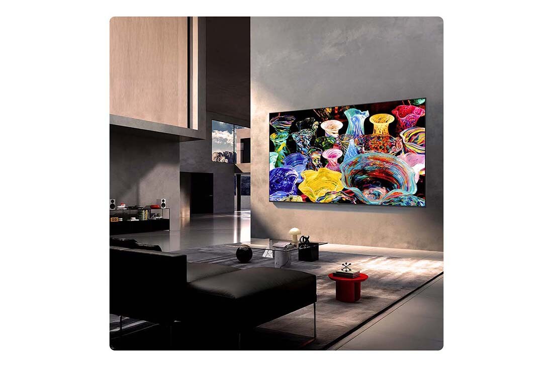 LG Mini RGB evo 75 ιντσών AI MRGB87 4K Smart TV 2026, Η LG Mini RGB evo AI MRGB85 είναι επιτοίχια σε έναν ευρύχωρο, σύγχρονο χώρο καθιστικού, προβάλλοντας ένα ζωντανό αφηρημένο έργο τέχνης με στροβιλισμένα, πολύχρωμα στοιχεία., 75MRGB87B6B, thumbnail 10