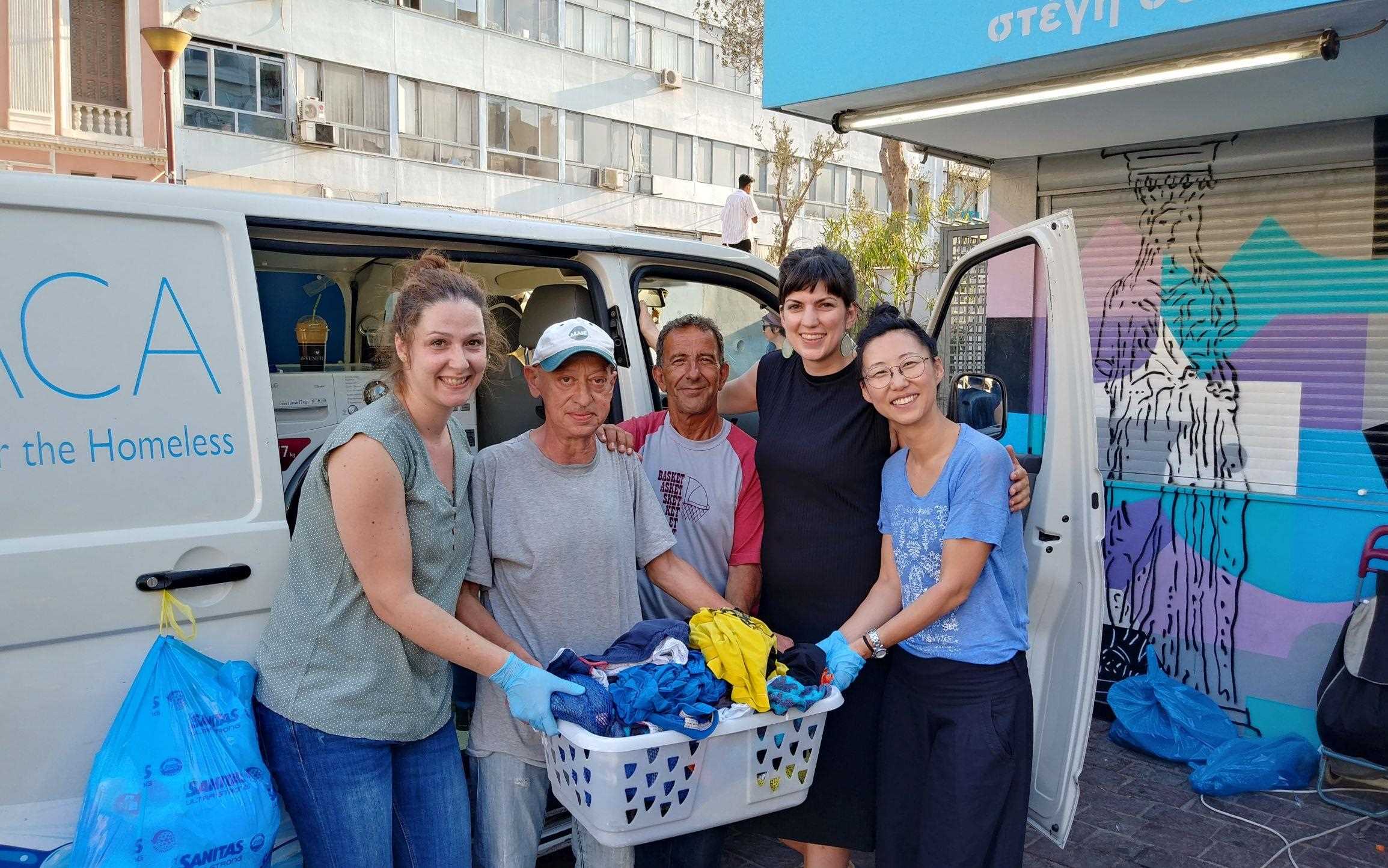 LG employees volunteer at Ithaca laundry - Photo 1.JPG