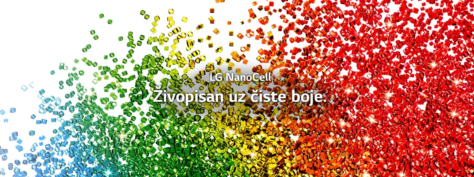 Zaslon ispunjen česticama živih boja koje prskaju ispred bijele pozadine.