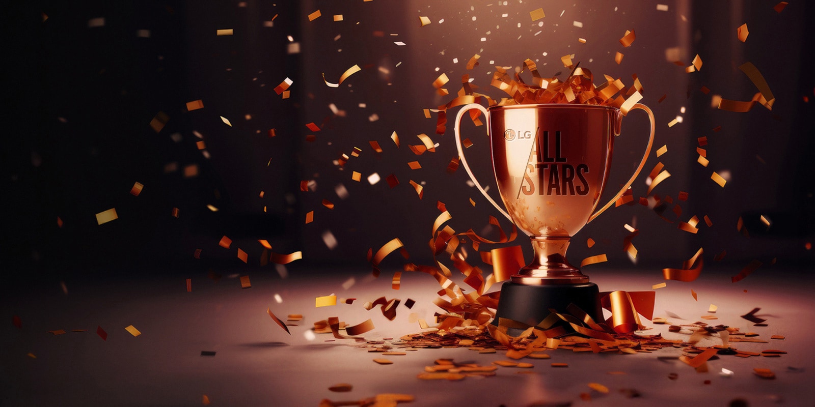 Zlatni trofej s ugraviranim natpisom "LG All Stars", okružen prskalicama koje eksplodiraju oko njega.