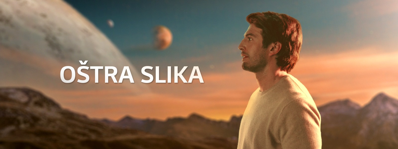 Čovjek koji stoji na planetu i gleda u jednom smjeru. Na slici se nalazi i tekst „OŠTRA SLIKA”.