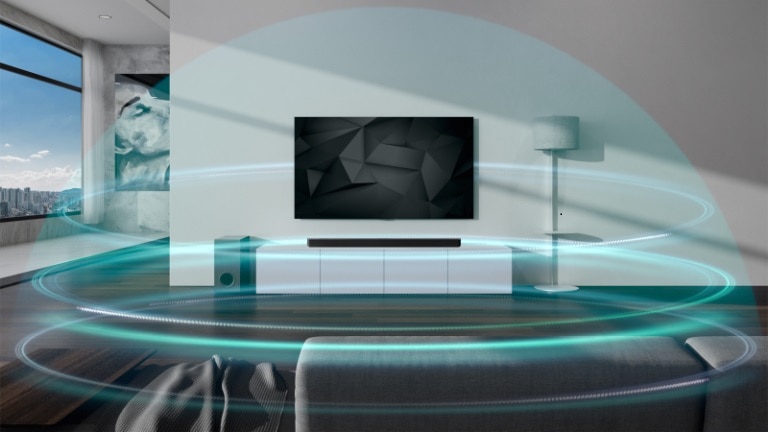 Zvučni valovi u obliku plave kupole i s tri sloja prekrivaju Sound Bar i televizor u dnevnom boravku. Oznaka NOVO prikazana je u gornjem lijevom kutu.