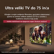 LG Televizor LG QNED evo AI QNED87 4K Smart TV 2025 od 55 inča, Djevojčica i pas sjede ispred televizora LG QNED TV montiranog na zid na kojem se prikazuju tri slona kako hodajući izlaze iz  LG Soundbara. Naslov upućuje na to kako je svaka akcija uzbudljivija na o, 55QNED87A3B, thumbnail 8