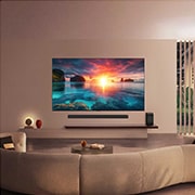 LG 55 inča LG OLED evo AI G6 4K Smart TV 2026, Na televizoru LG OLED evo AI G6 prikazuje se živopisna scena zalaska sunca na oceanu, s kućnim kinom Soundbarom i zvučnikom postavljenim ispod zaslona, poboljšavajući miran i ugodan životni prostor., OLED55G61LW, thumbnail 15