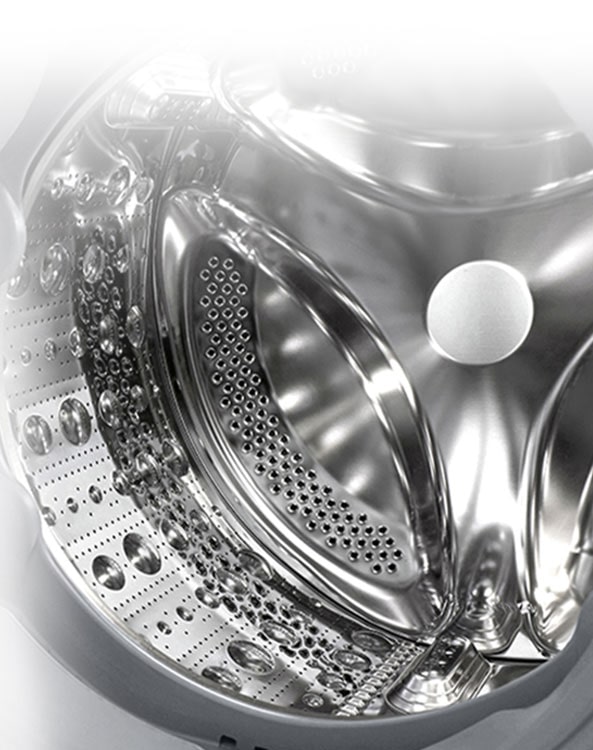 תמונה פנימית של מכונת הכביסה, שבה ניתן לראות מרים עשוי פלדת אל חלד.