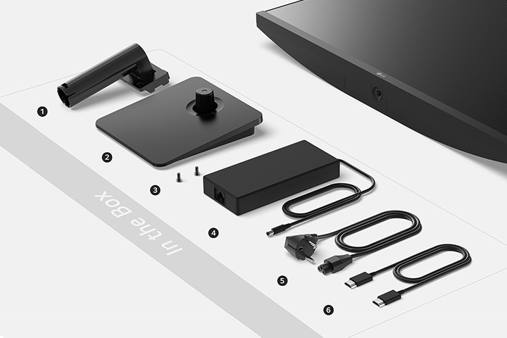 גוף המעמד, בסיס המעמד, ברגים, מתאם מתח, כבל מתח וכבל HDMI בקופסה.