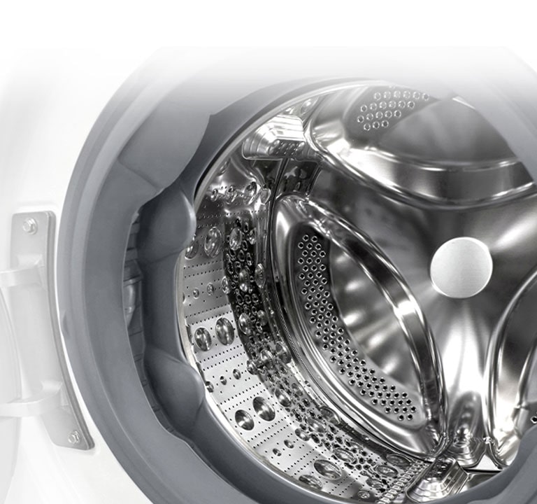 תמונה פנימית של מכונת הכביסה, שבה ניתן לראות מרים עשוי פלדת אל חלד.