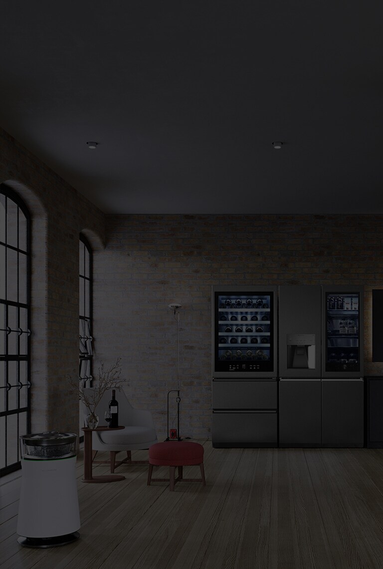 Il frigorifero e la cantina di LG SIGNATURE sono posizionati nella cucina del magazzino in mattoni con gli arredamenti di Flexform.