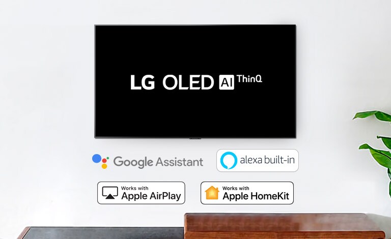 تلفزيون معلق على الجدار يعرض شعار OLED AI ThinQ من إل جي على خلفية سوداء