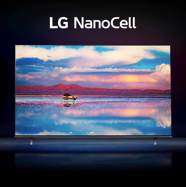 تلفاز LG NanoCell على خلفية سوداء.  يعرض التلفاز سيارة تسير أمام سلسلة جبال منخفضة في المياه التي تعكس السماء المفعمة بالحيوية. 